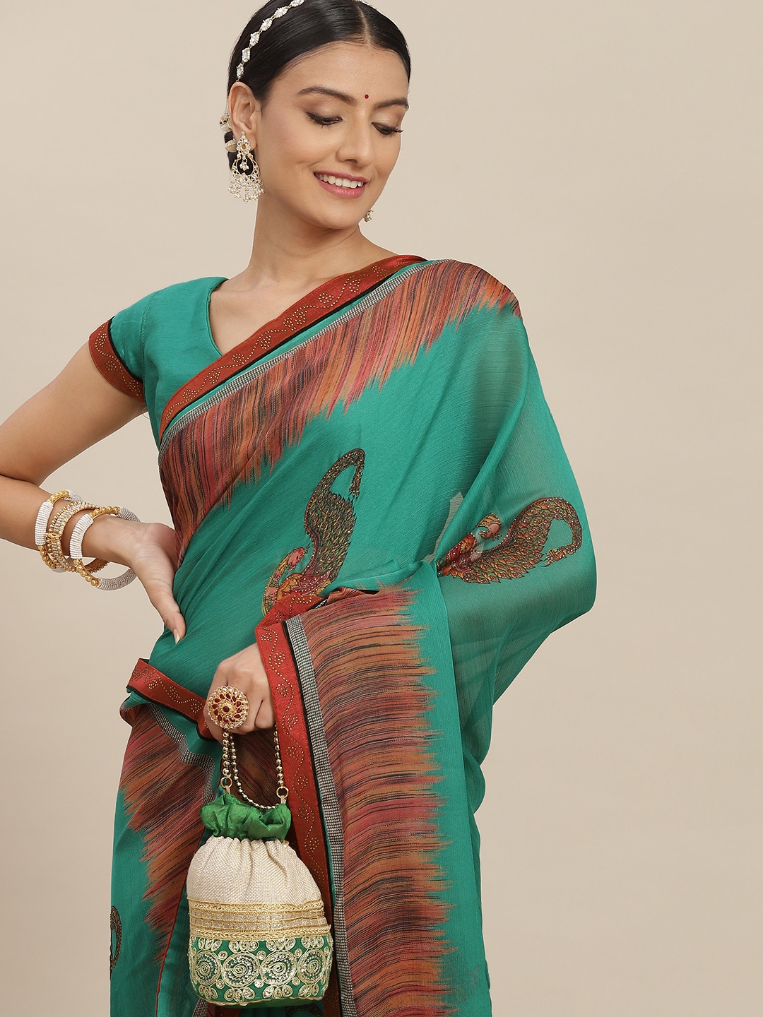 

SAARYA Green Ethnic Motifs Sequinned Saree
