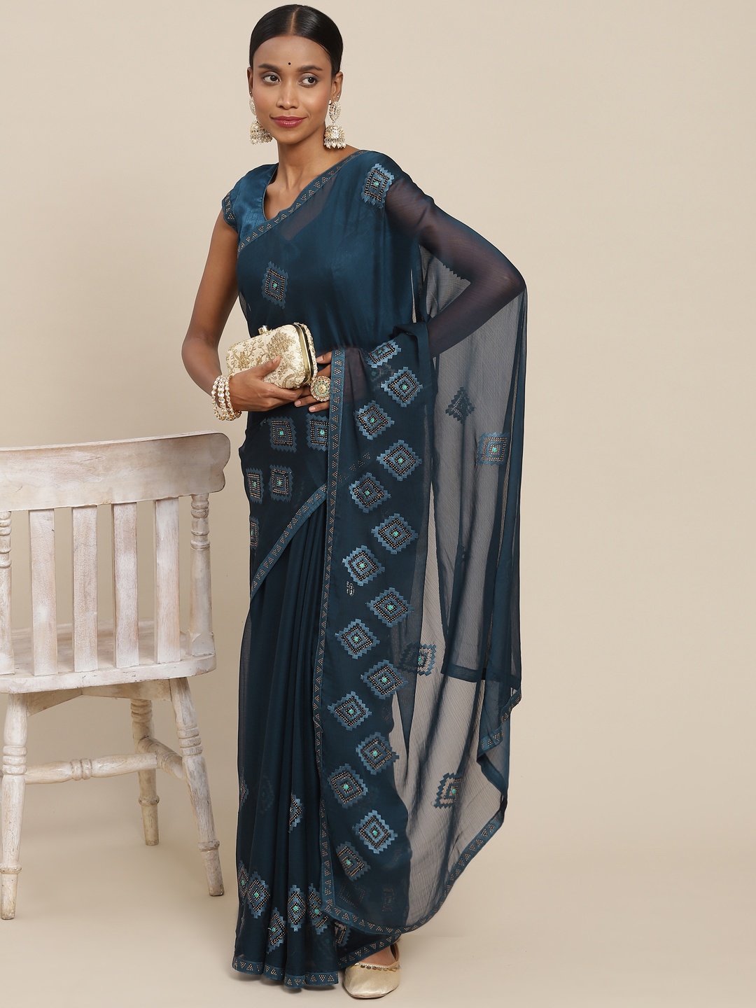 

SAARYA Teal Ethnic Motifs Sequinned Pure Chiffon Saree