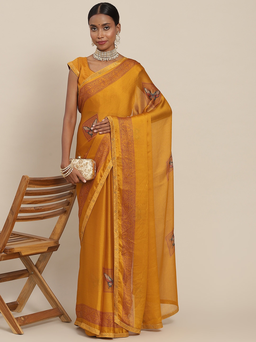 

SAARYA Yellow Ethnic Motifs Sequinned Pure Chiffon Saree