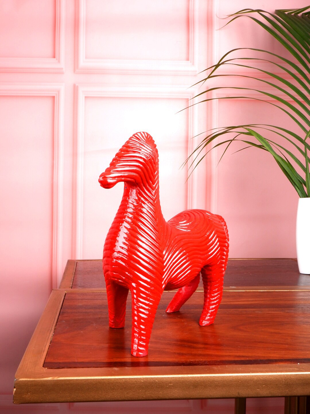 

THE WHITE INK DECOR Red Solid Zebra Figurine Showpiece