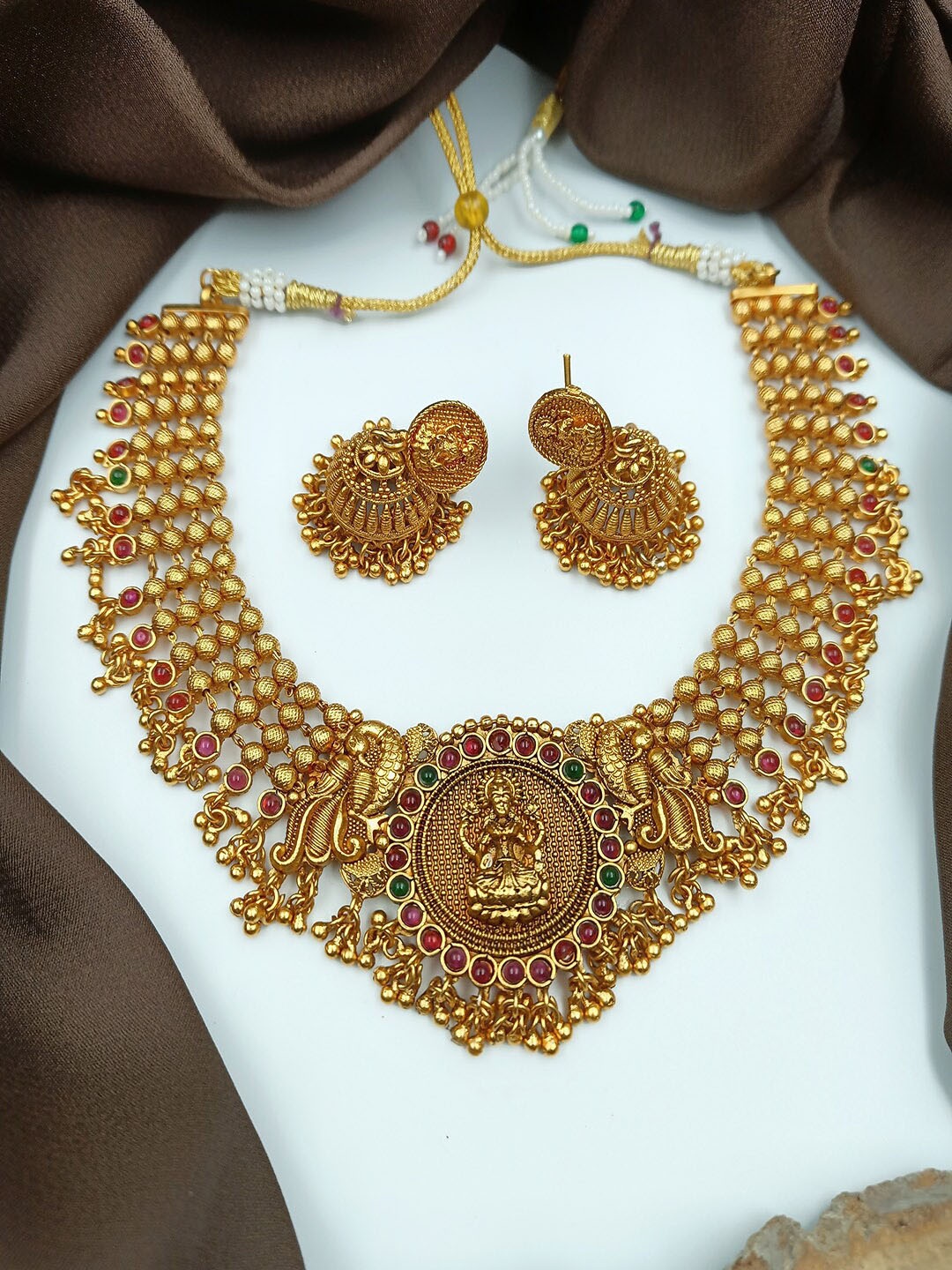 

StileAdda Gold-Plated Red Stone-Studded Temple Jewellery Set