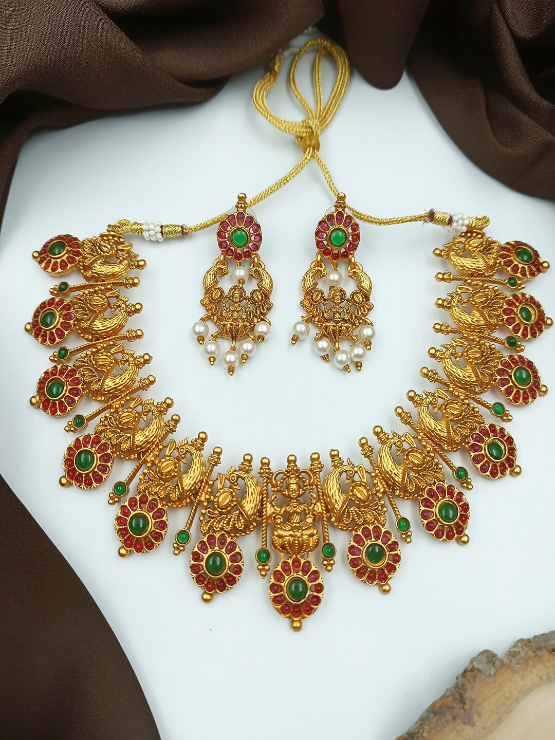 

StileAdda Gold-Plated Red & Green Stone-Studded & Beaded Jewellery Set