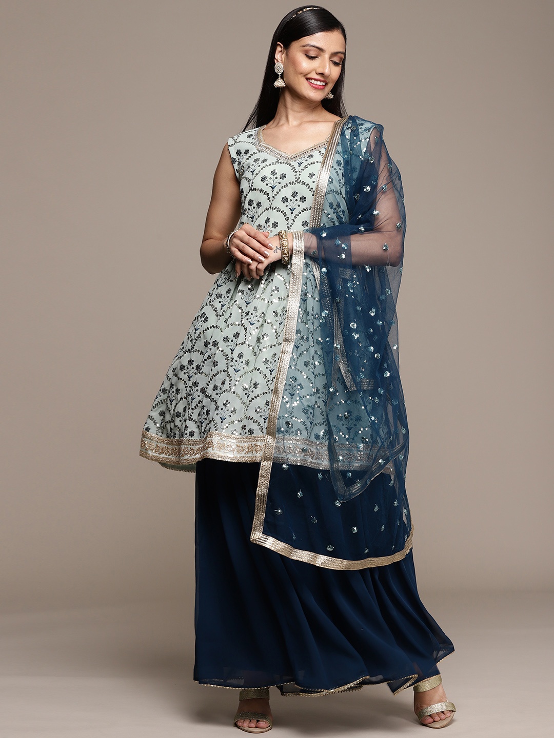 

SAARYA Women Turquoise Blue Ethnic Motifs Embroidered Sequinned Kurta with Sharara & With Dupatta