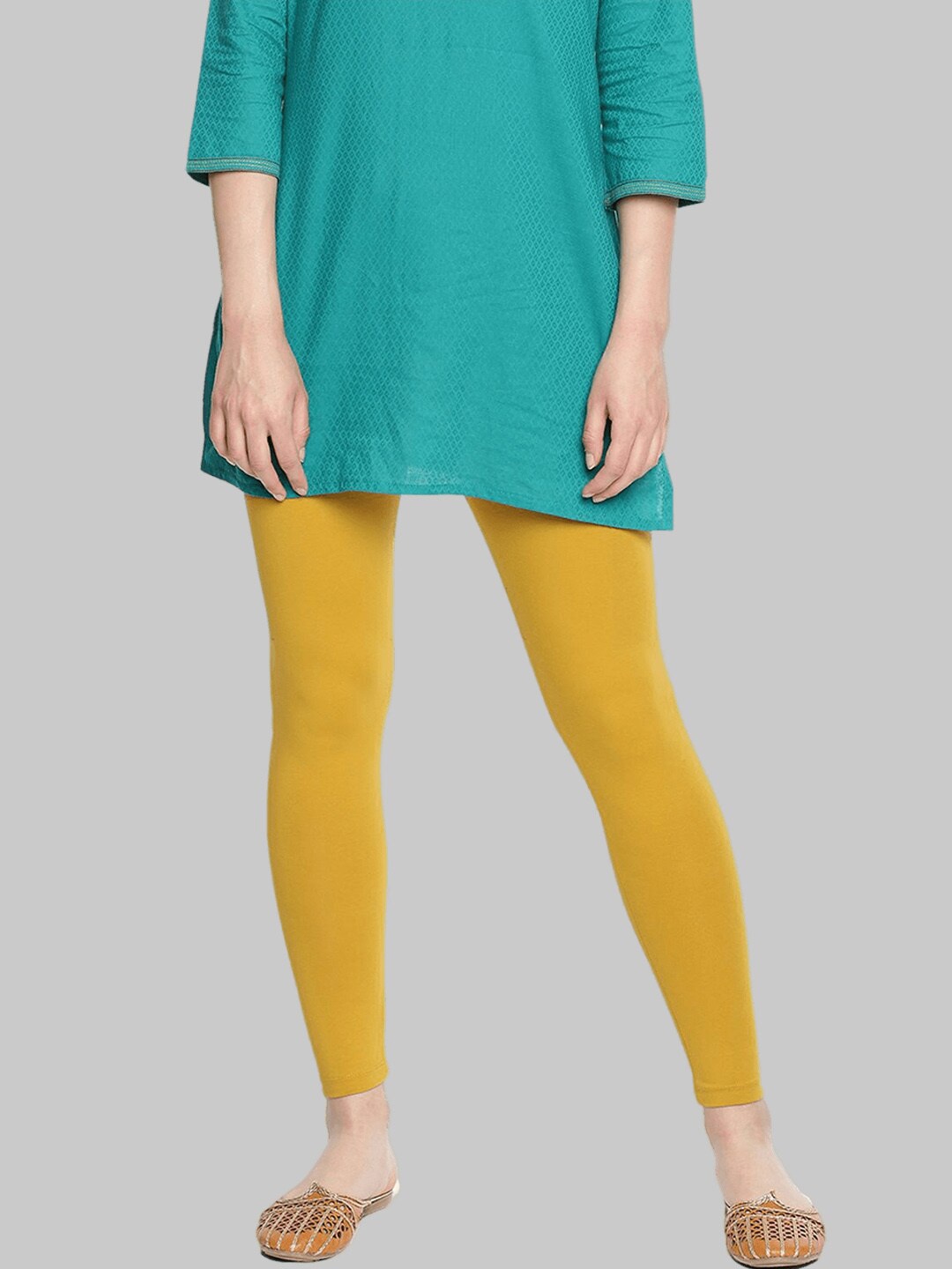 

Dollar Missy Women Golden Coloured Solid Slim-Fit Ankle-Length Leggings, Gold