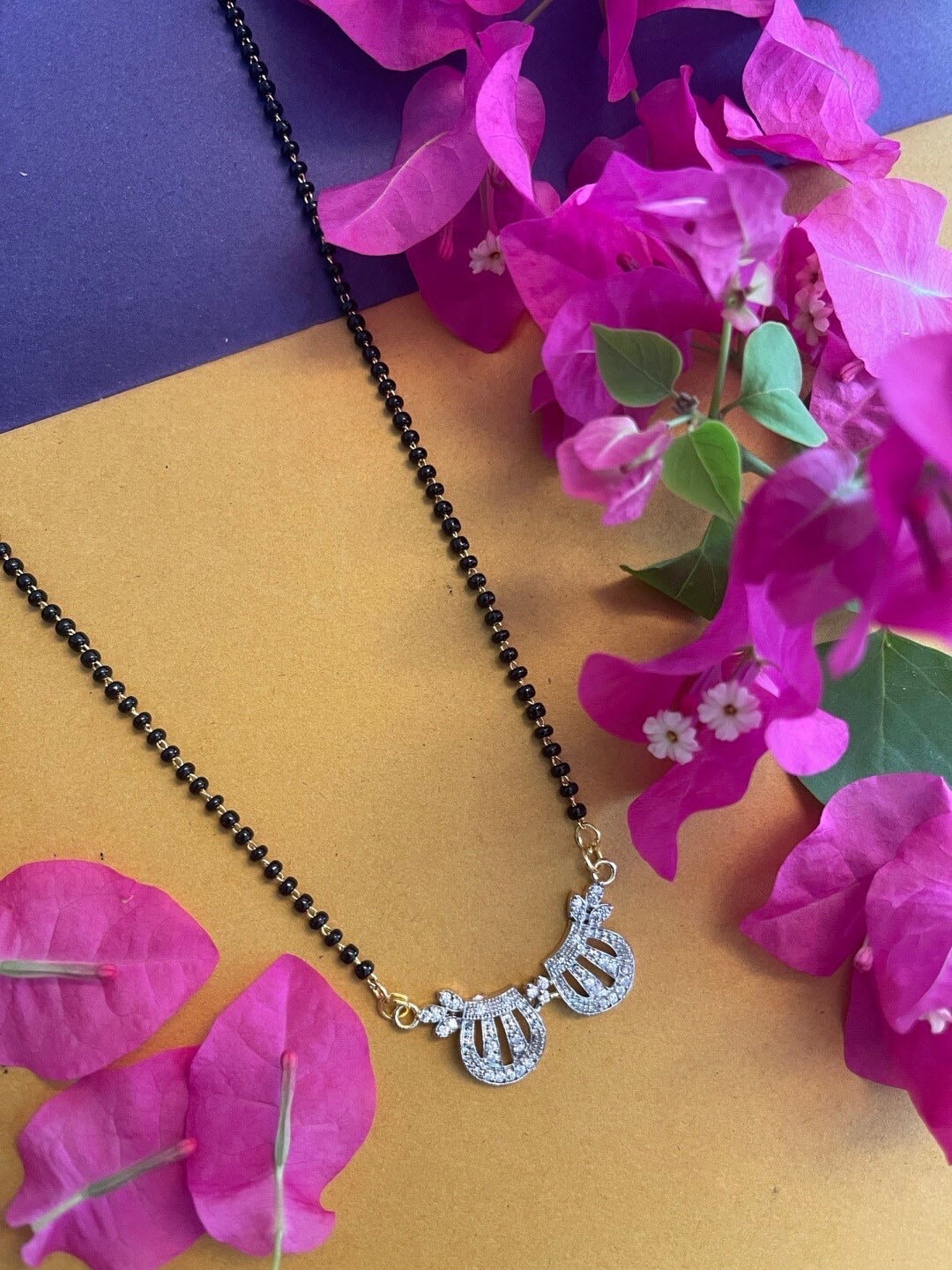 

Digital Dress Room Gold-Plated Black AD-Studded & Beaded Mangalsutra