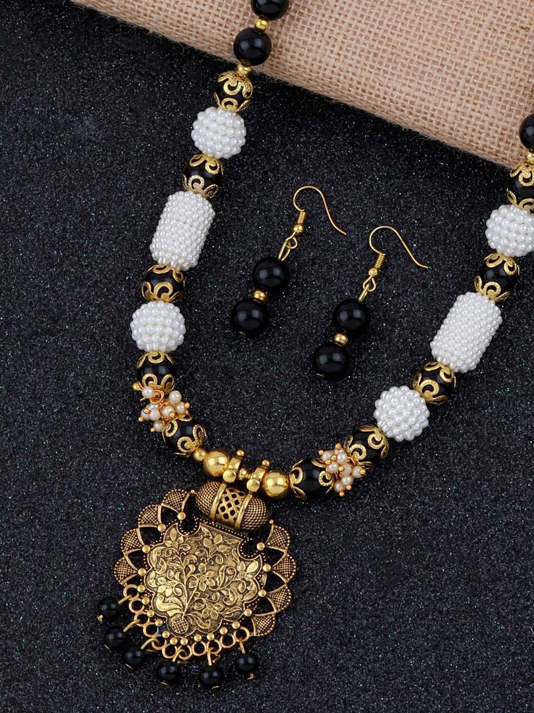 

Silver Shine Gold-Toned Black & White Stone Studded & Beaded Jewellery Set