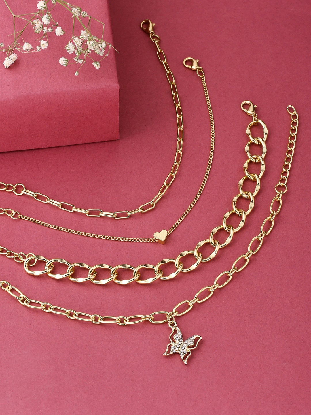 

kashwini Pack Of 4 Women Gold-Toned & White Brass Gold-Plated Charm Bracelet