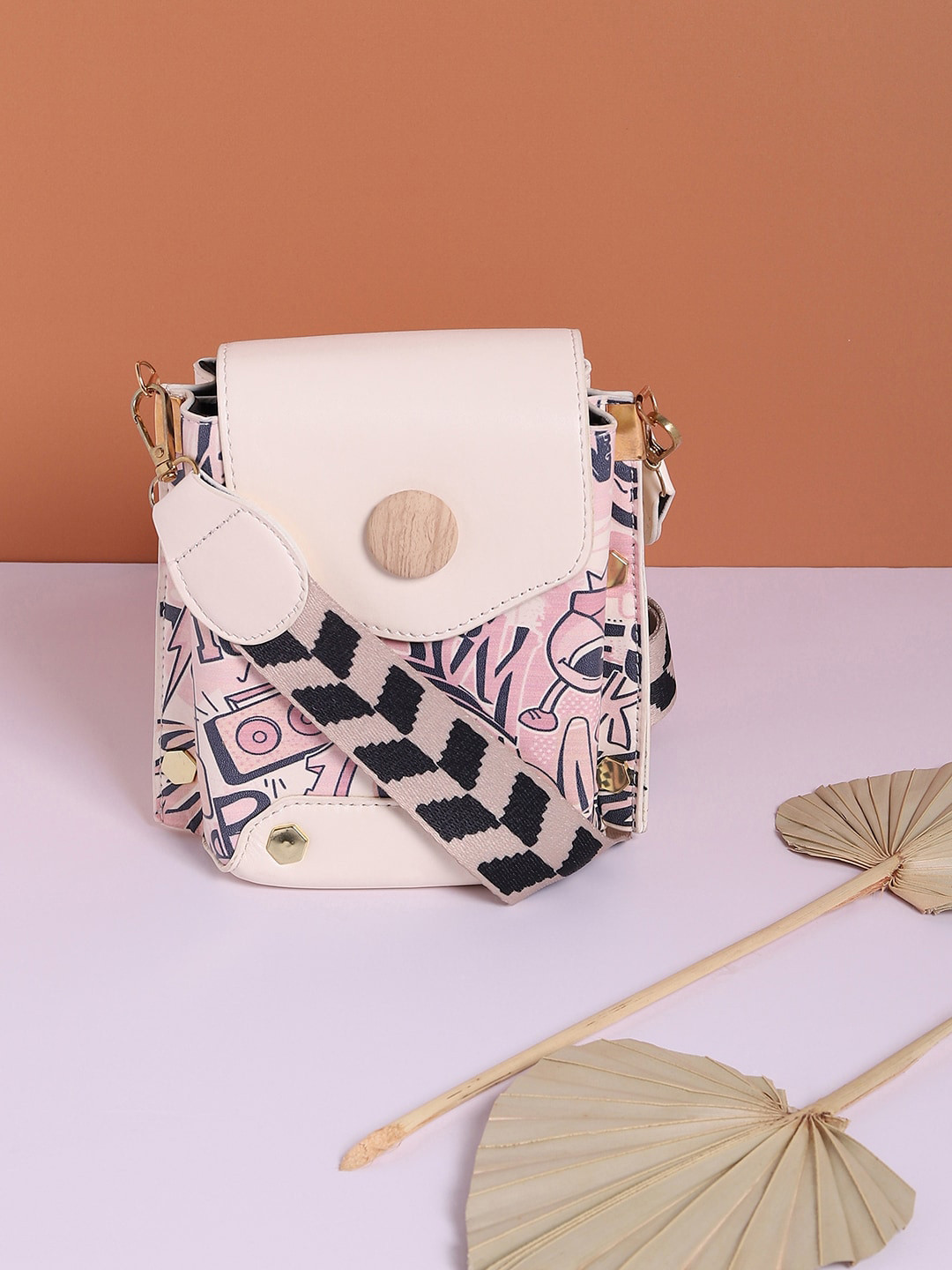 

HAUTE SAUCE by Campus Sutra Cream-Coloured Printed PU Structured Sling Bag