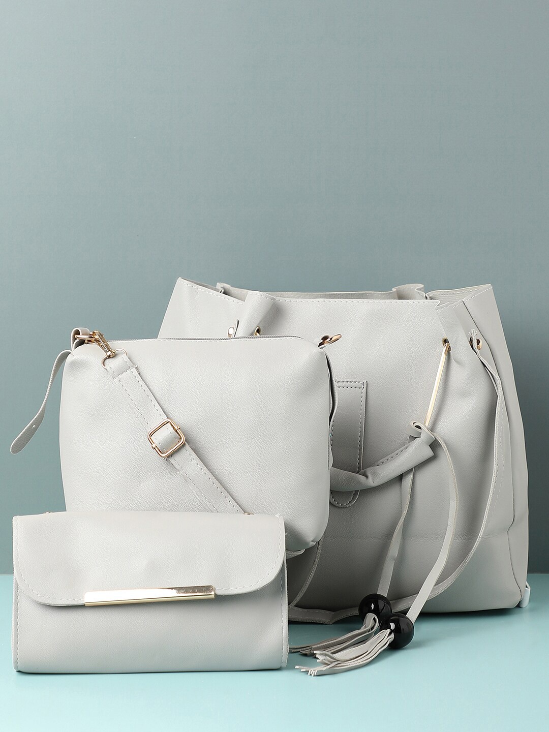 

HAUTE SAUCE by Campus Sutra Grey PU Bucket Handheld Bag with Cut Work