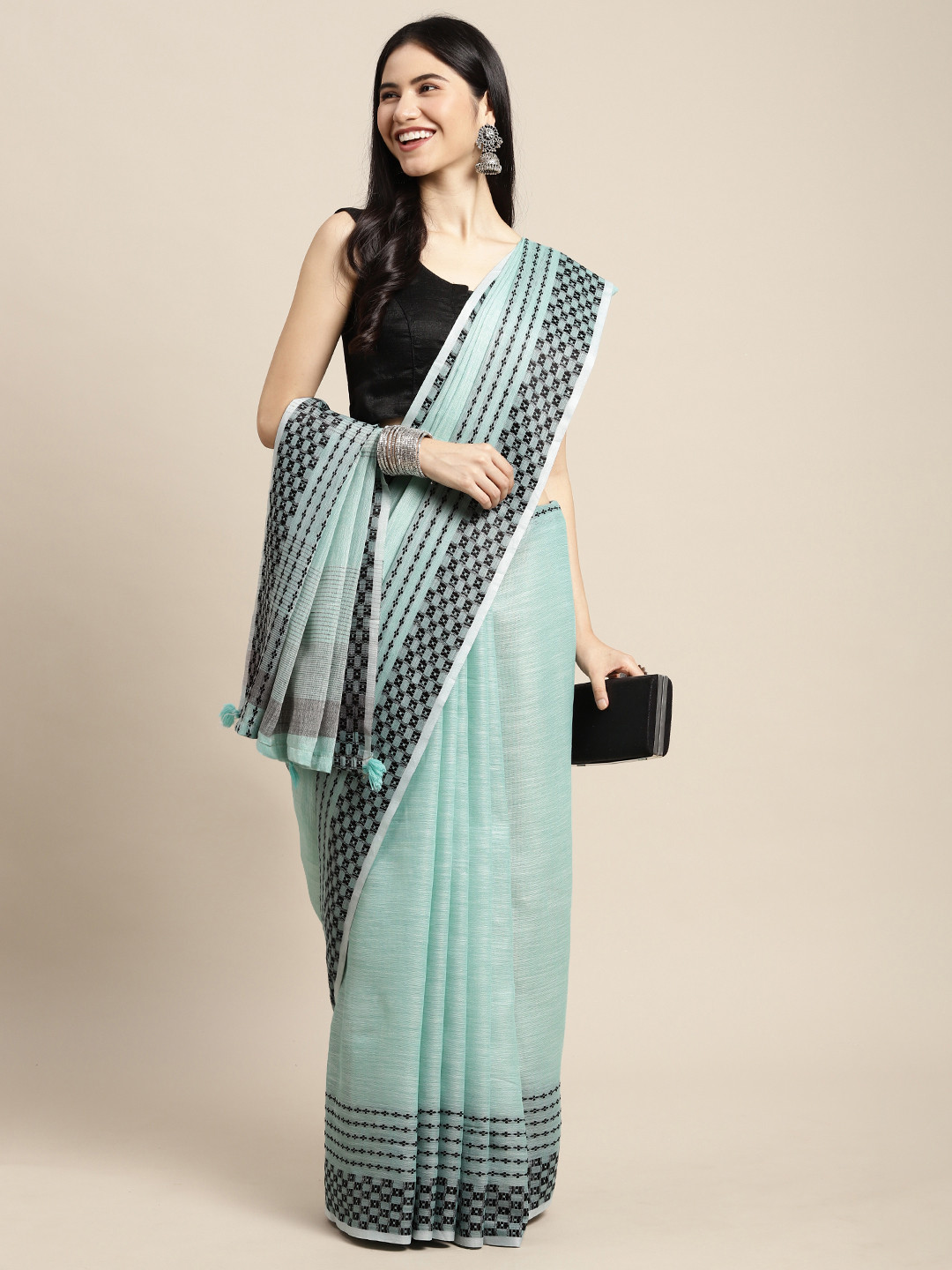 

SANGAM PRINTS Green & Black Solid Linen Blend Saree