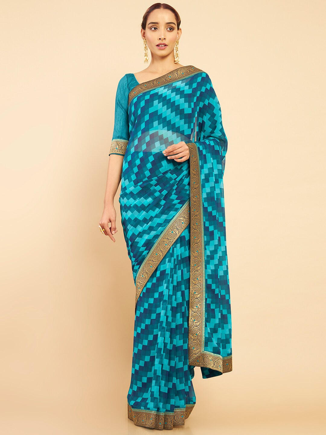 

Soch Teal & Gold Printed Pure Georgette Saree With Unstitched Blouse Piece