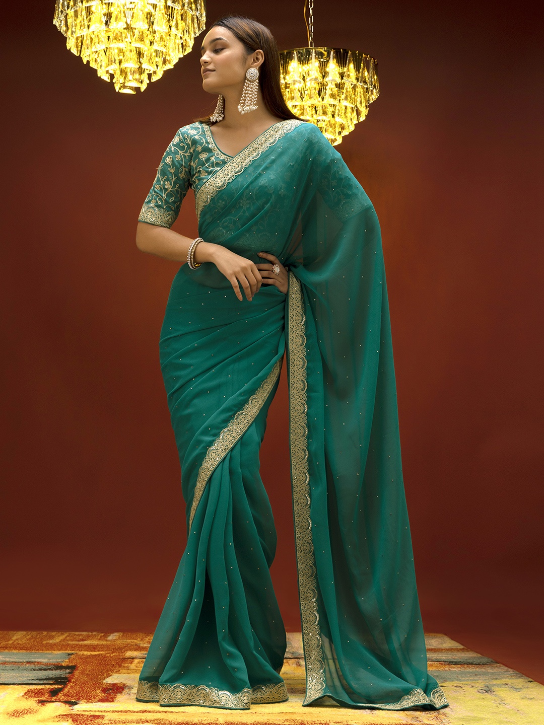 

Soch Turquoise Blue & White Embellished Pure Georgette Saree