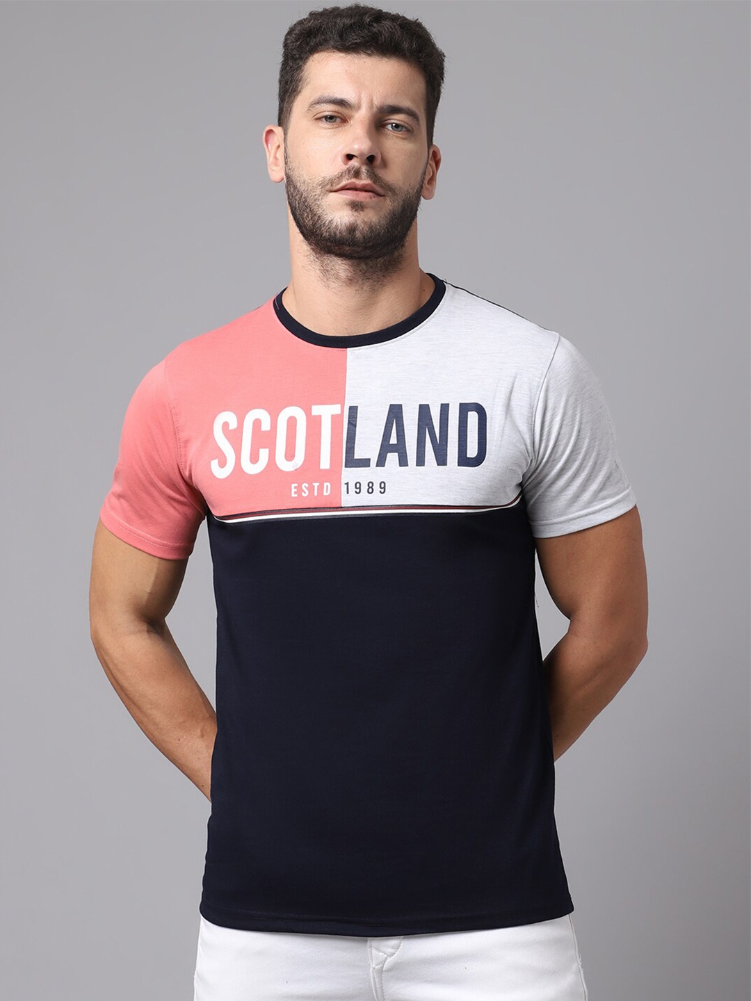 

Cantabil Men Pink & Navy Blue Colourblocked T-shirt