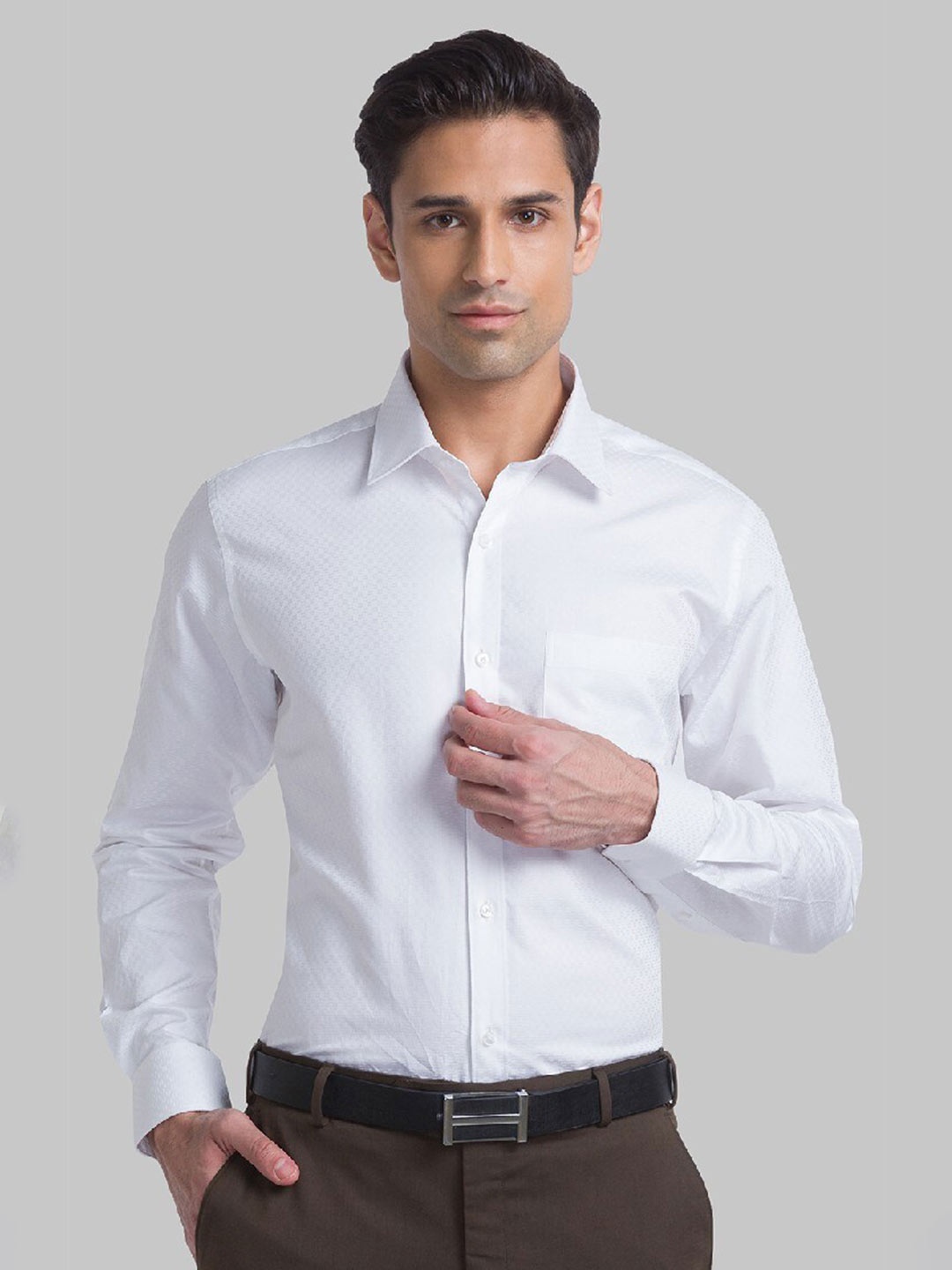

Raymond Men White Solid Pure Cotton Shirts