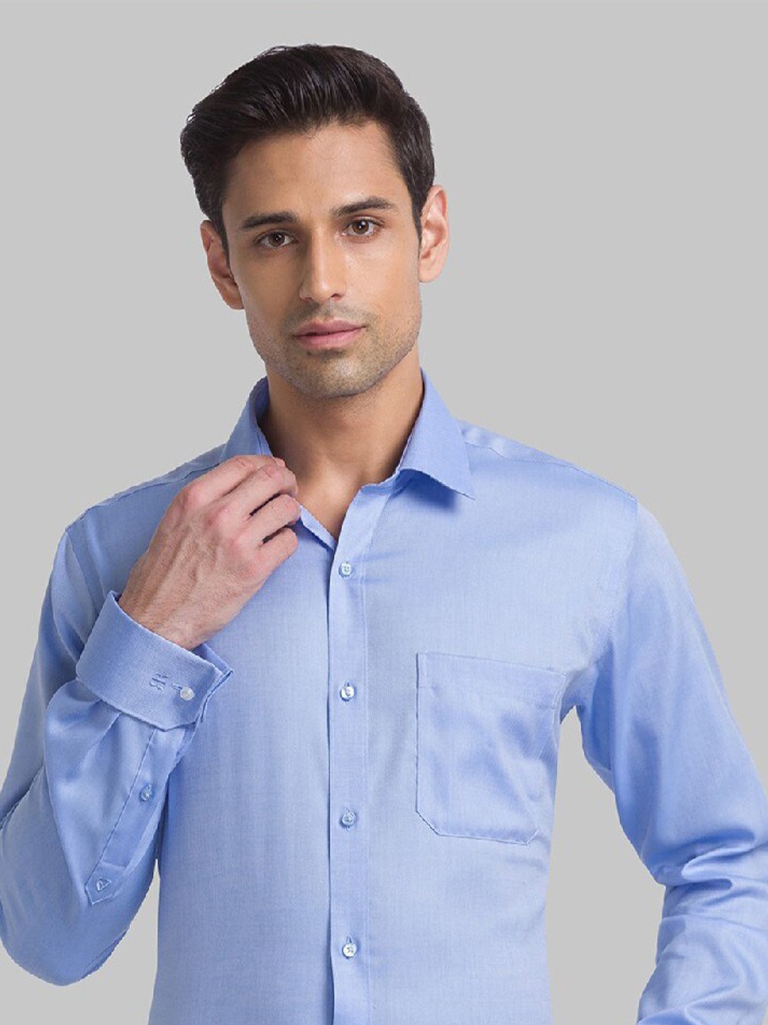 

Raymond Blue Solid Contemporary Fit Formal Shirts For Men