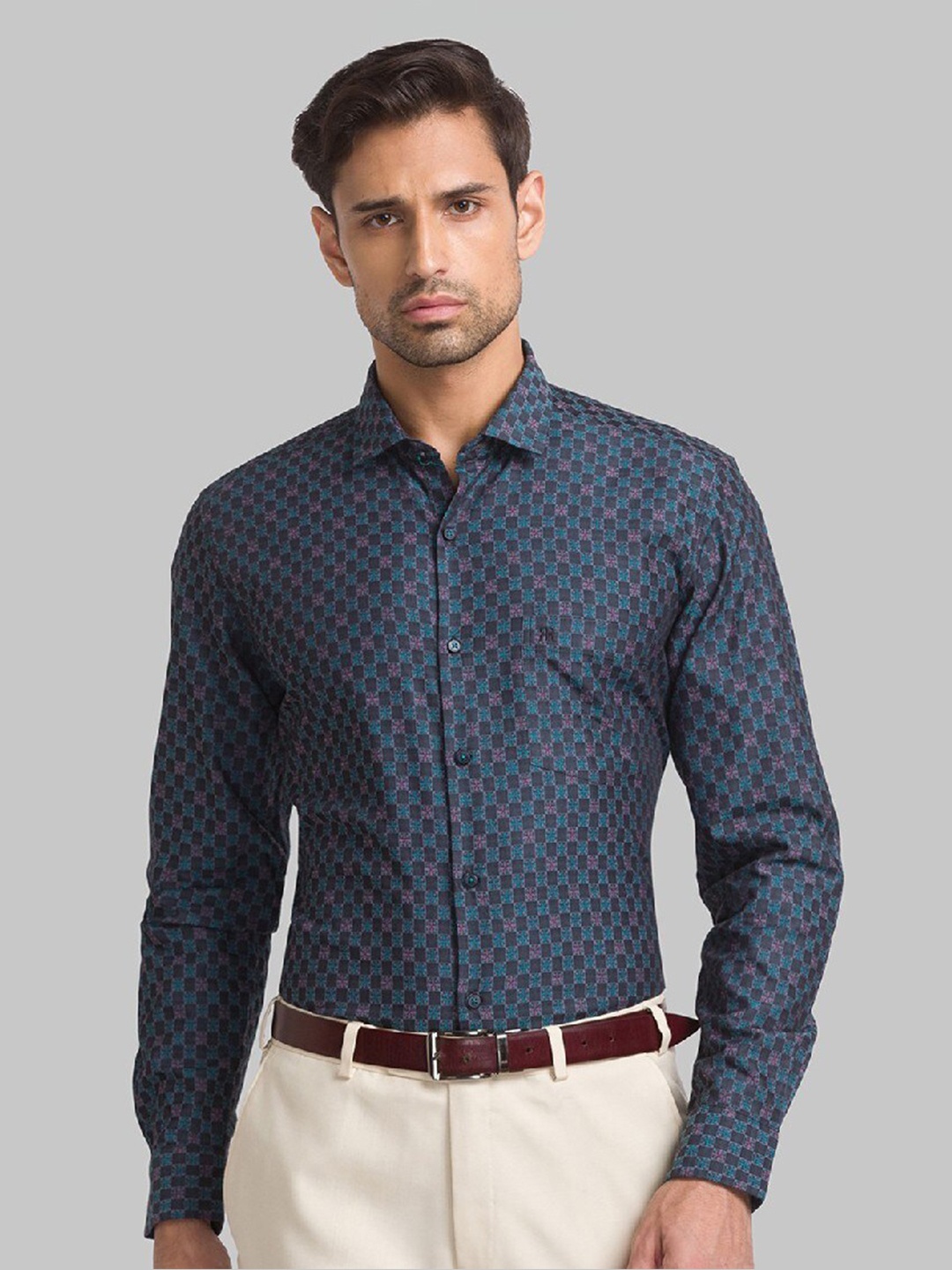 

Raymond Men Blue Self-Design Cotton Shirts
