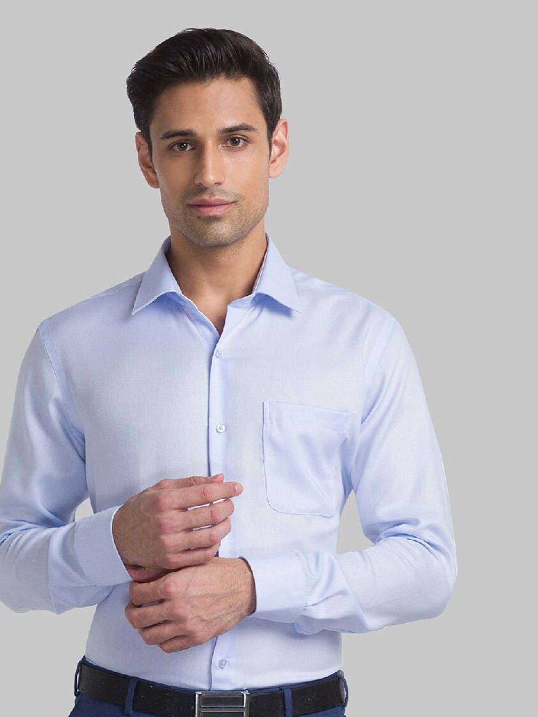 

Raymond Men Blue Solid Formal Shirt