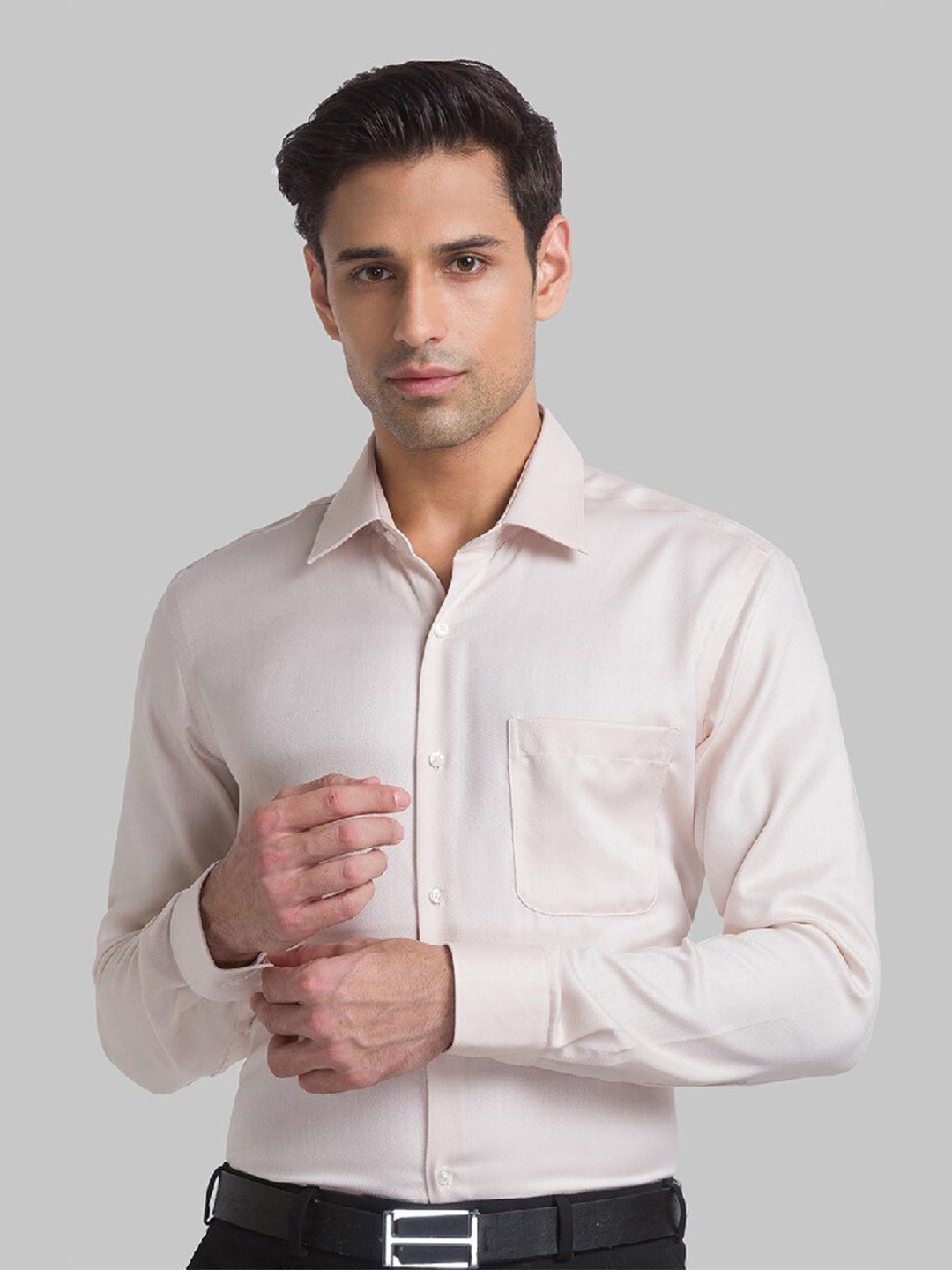

Raymond Men Beige Solid Pure Cotton Formal Shirt