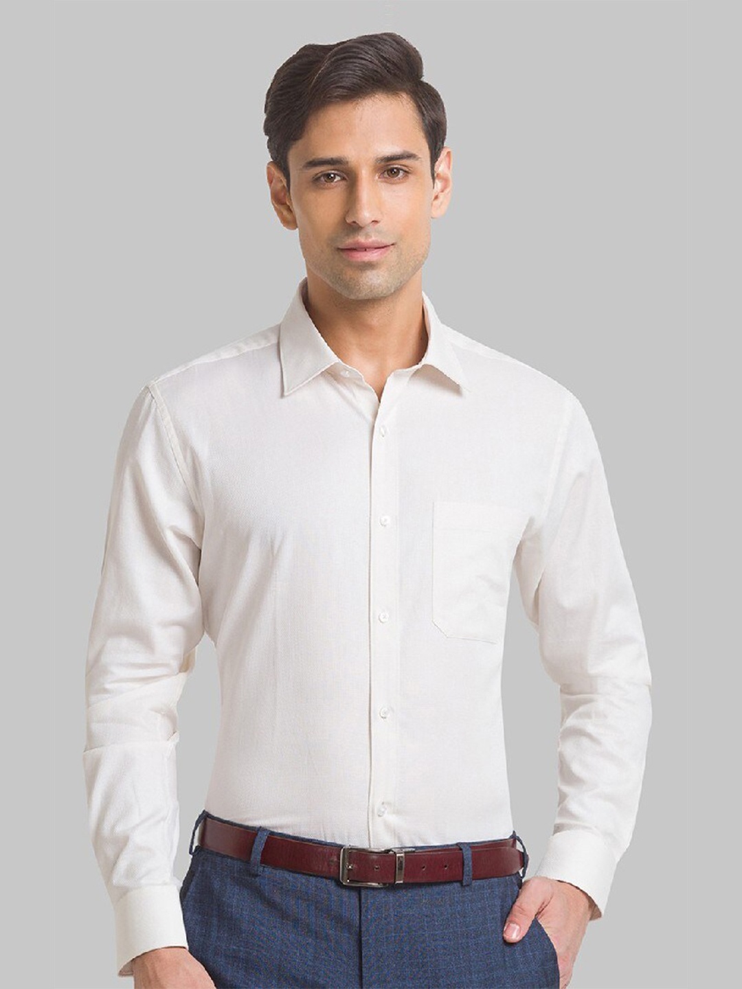 

Raymond Men Beige Solid Pure Cotton Formal Shirt