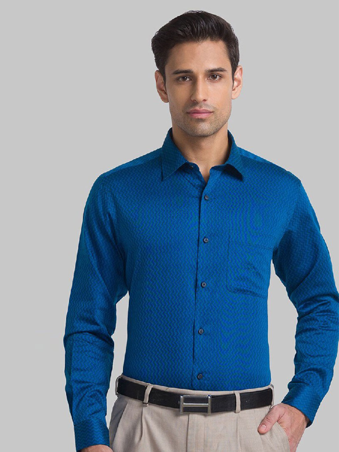 

Raymond Men Blue Self Design Pure Cotton Formal Shirt
