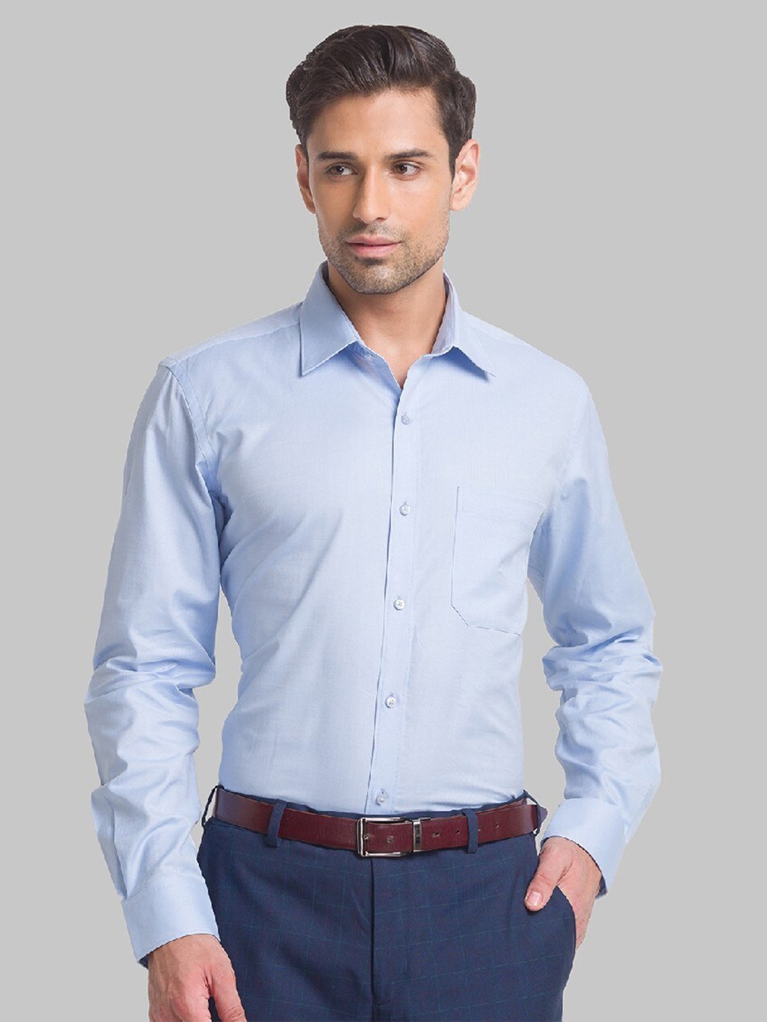 

Raymond Men Blue Solid Pure Cotton Formal Shirt