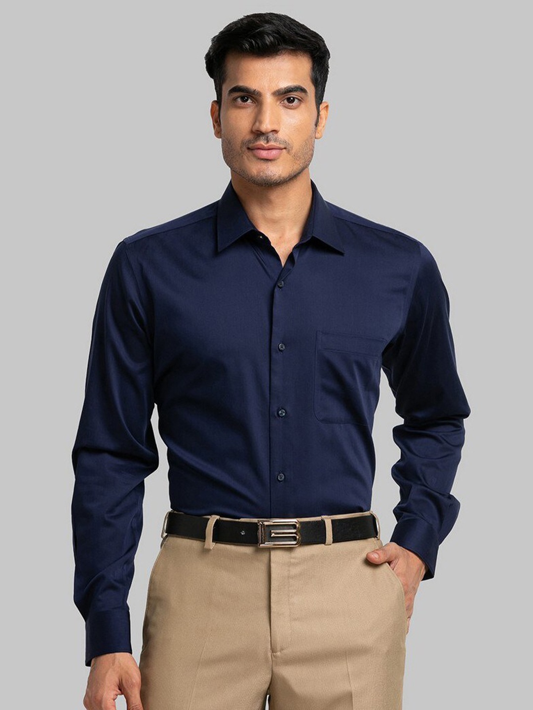 

Raymond Men Blue Solid Pure Cotton Formal Shirt