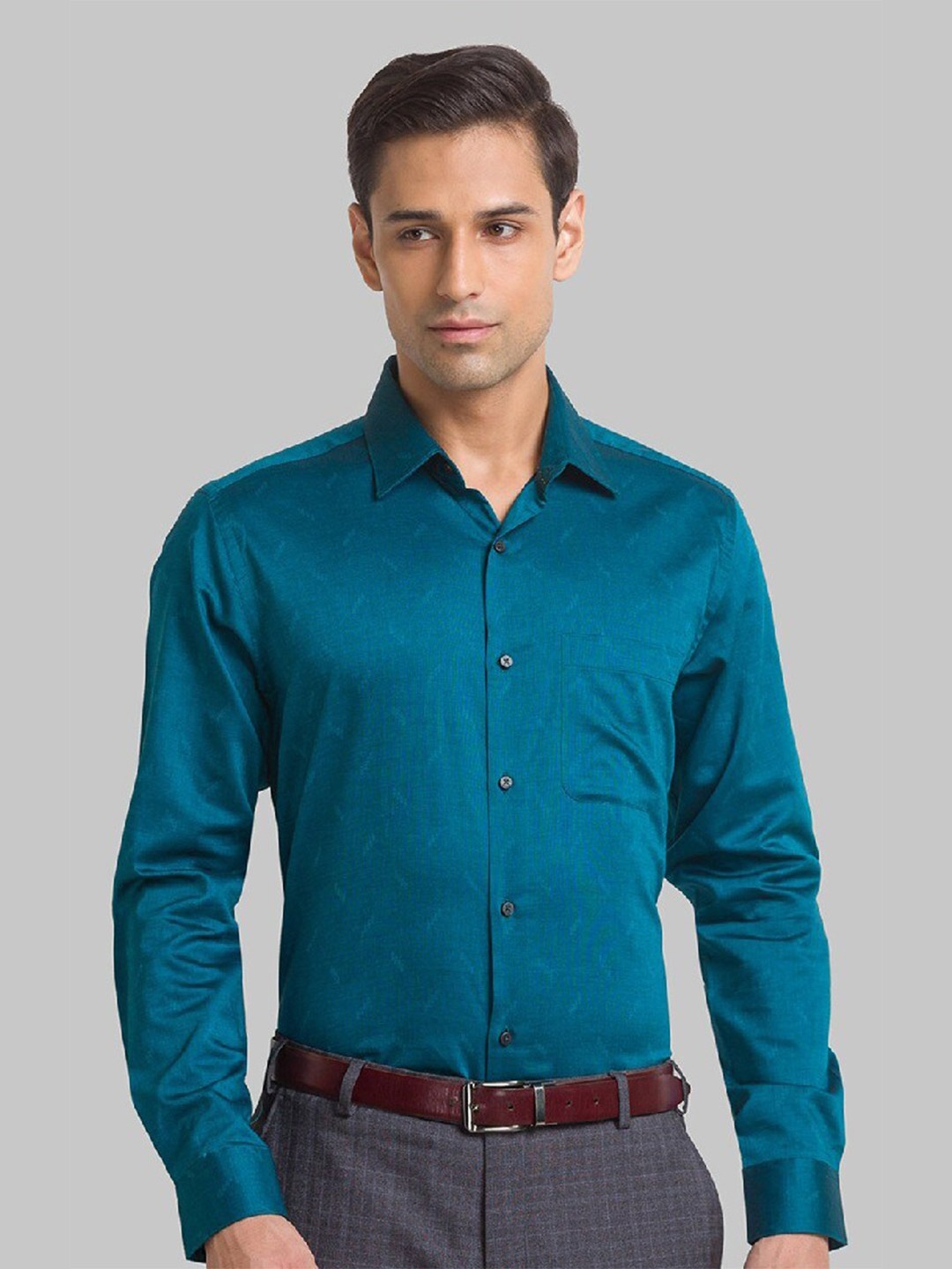 

Raymond Men Green Solid Casual Shirt