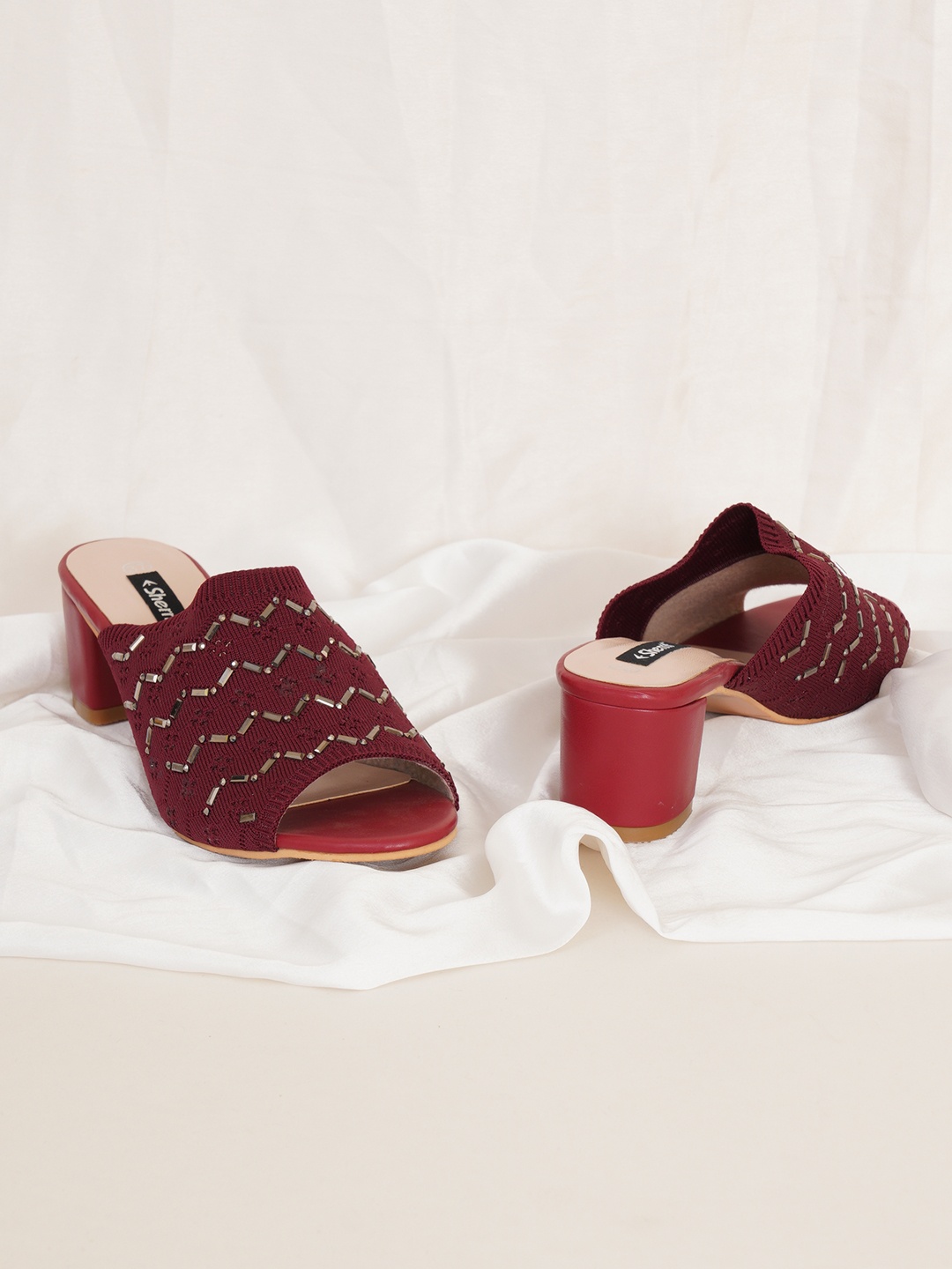 

Sherrif Shoes Women Maroon Textured Party Block Heels