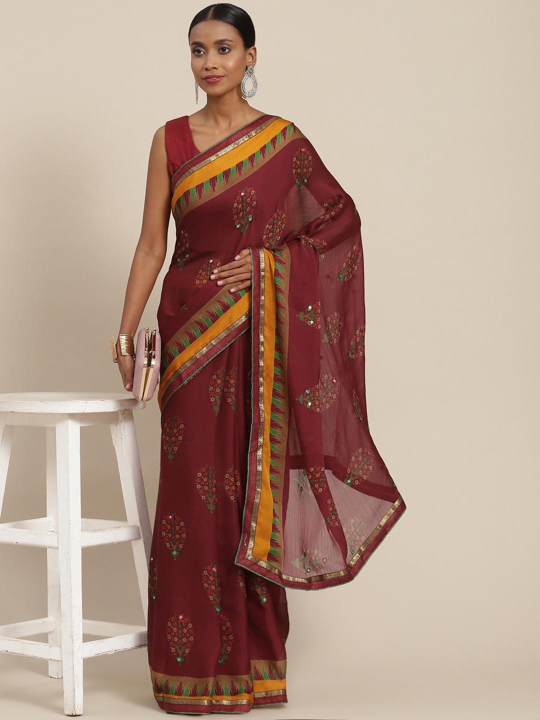 

SAARYA Maroon & Yellow Ethnic Motifs Zari Saree