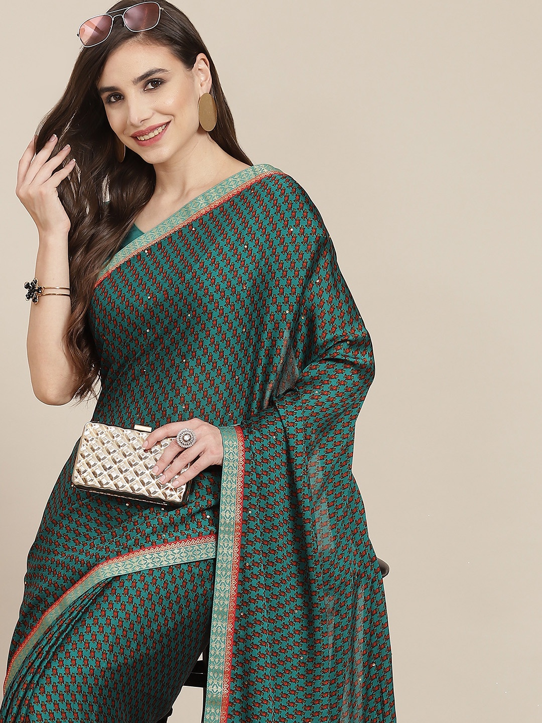 

SAARYA Green Ethnic Motifs Zari Saree