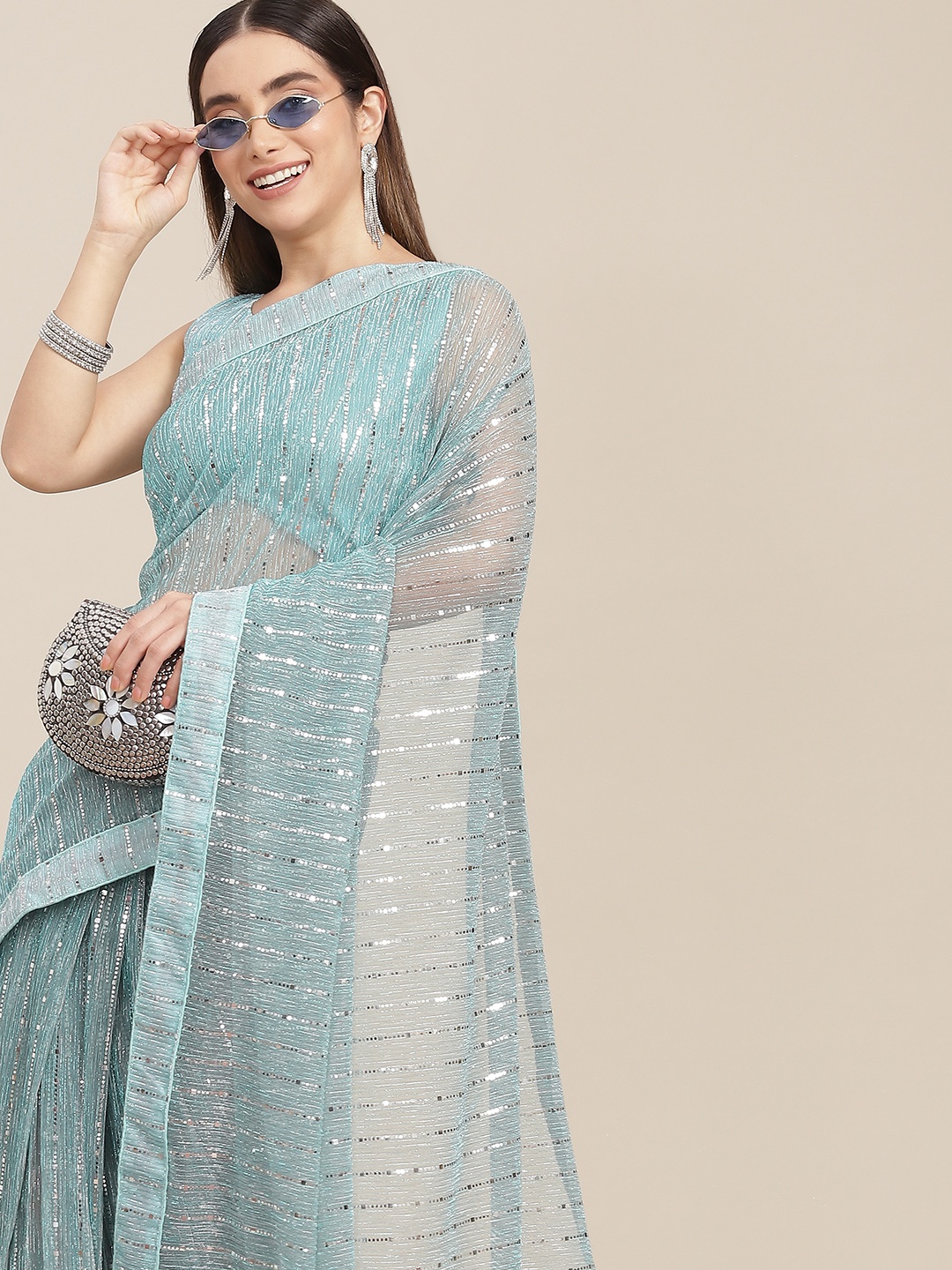 

SAARYA Woman Turquoise Blue Ethnic Motifs Saree
