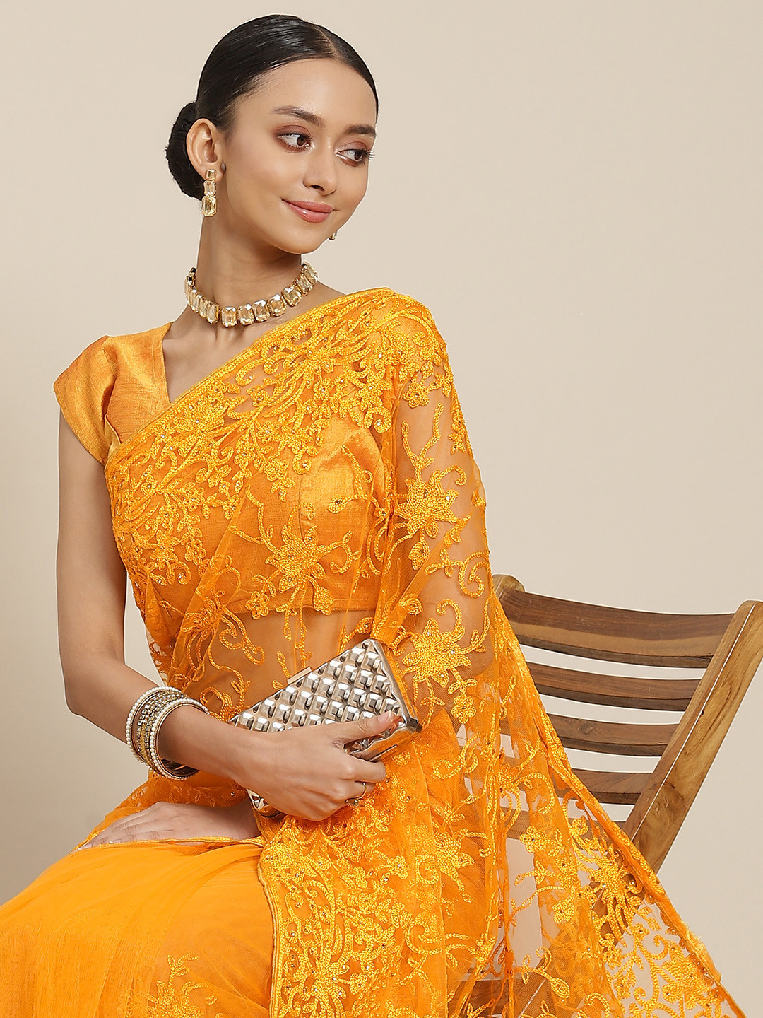 

SAARYA Yellow Ethnic Motifs Embroidered Beads and Stones Net Saree