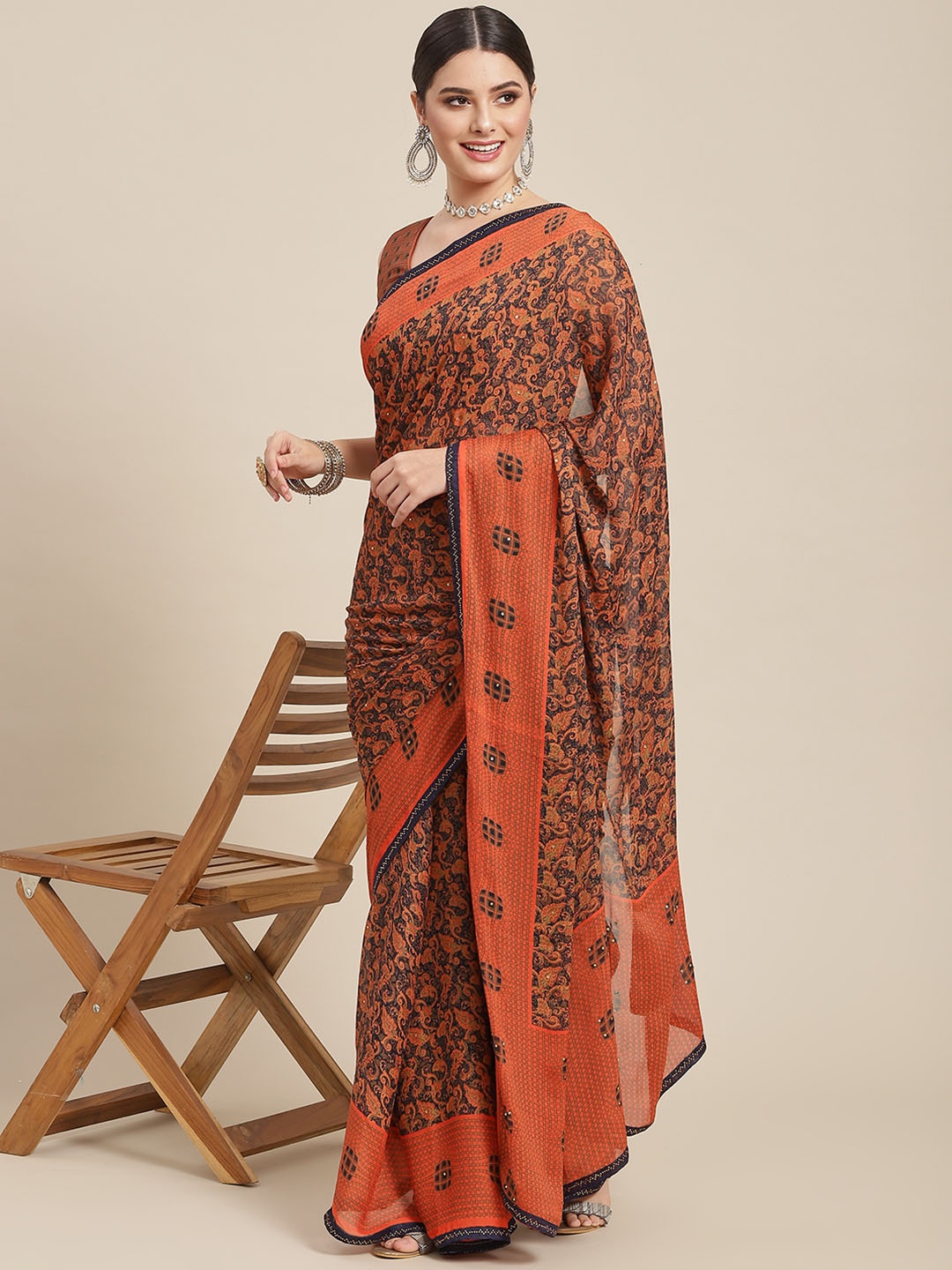 

SAARYA Orange Woven Design Stones Pure Georgette Saree