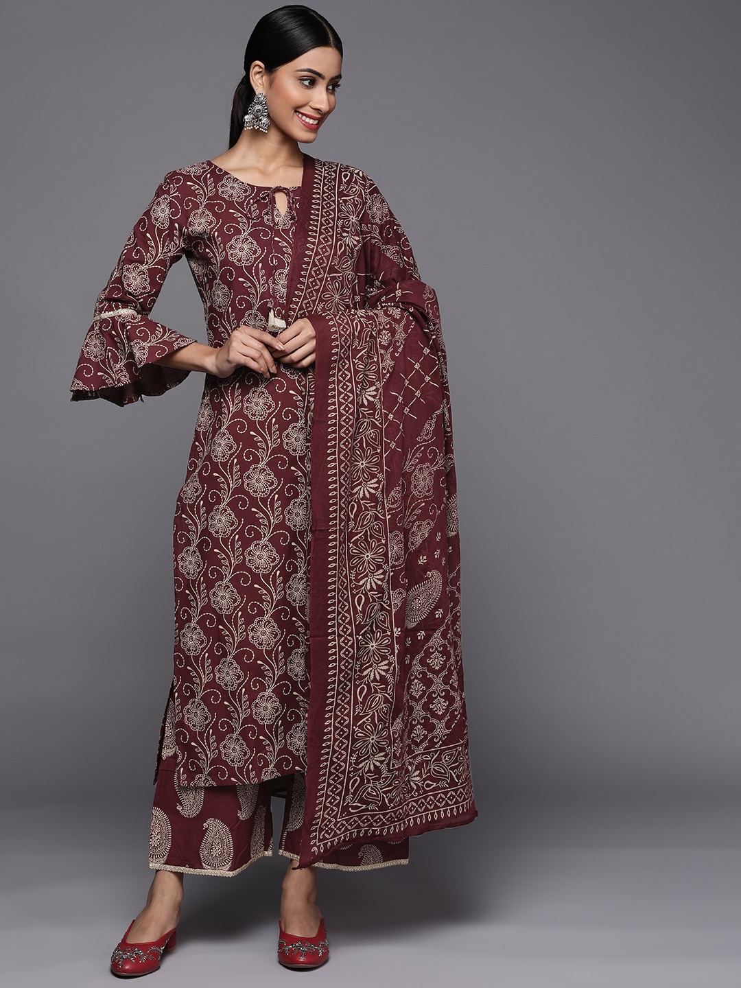 

Indo Era Women Purple Floral Kurta with Palazzos & With Dupatta