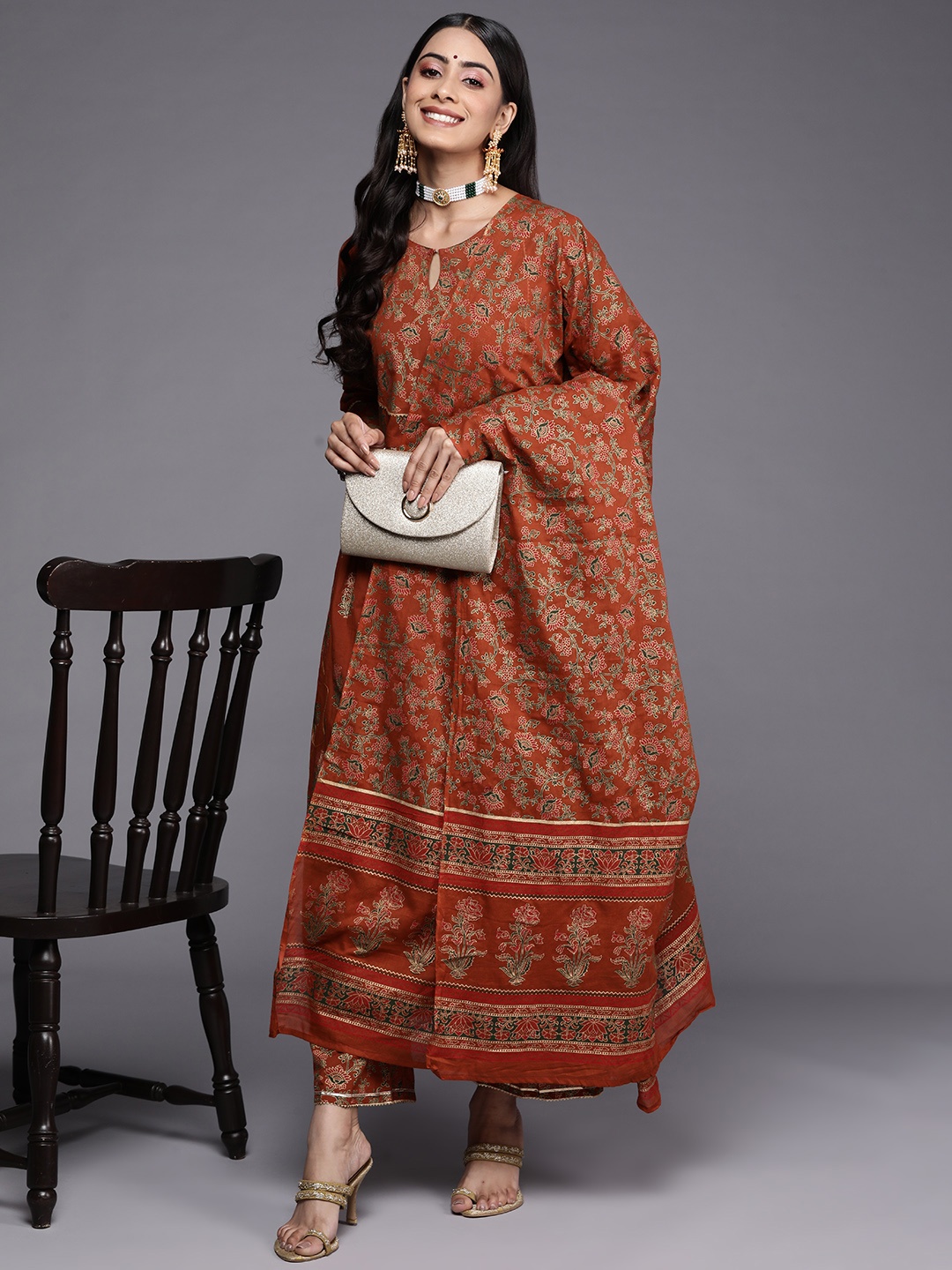

Indo Era Women Brown Floral Printed Gotta Patti Liva Kurta with Trousers & With Dupatta