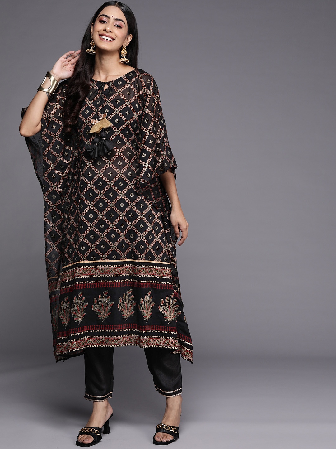 

Indo Era Women Black Ethnic Motifs Printed Kurta with Palazzos