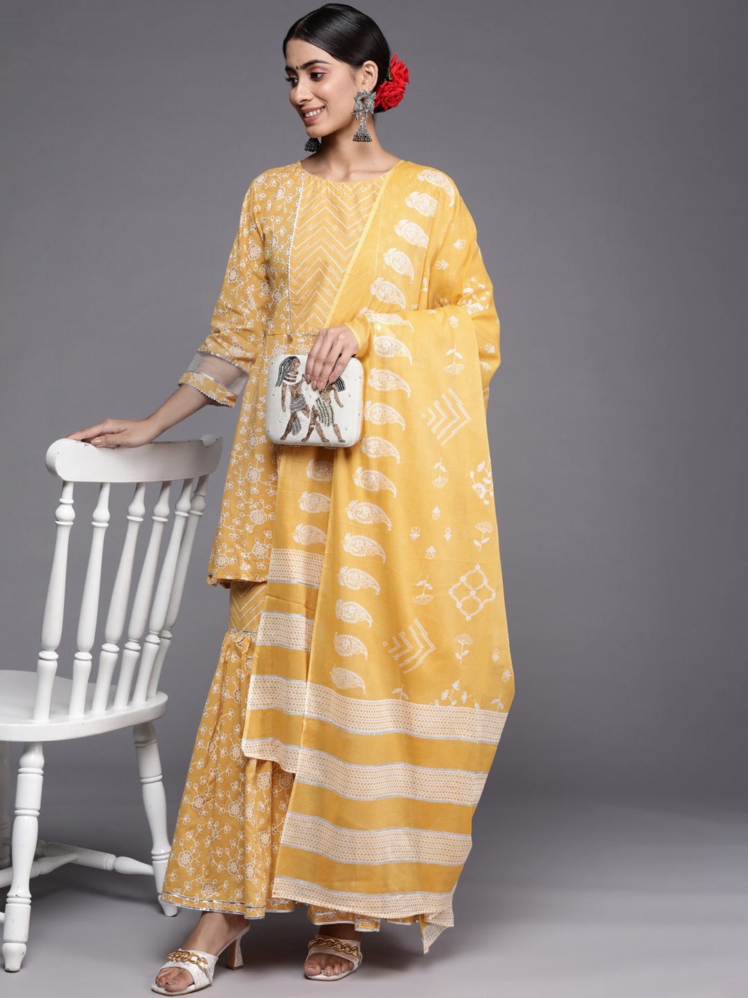 

Indo Era Women Yellow Floral Printed Gotta Patti Kurta with Sharara & With Dupatta