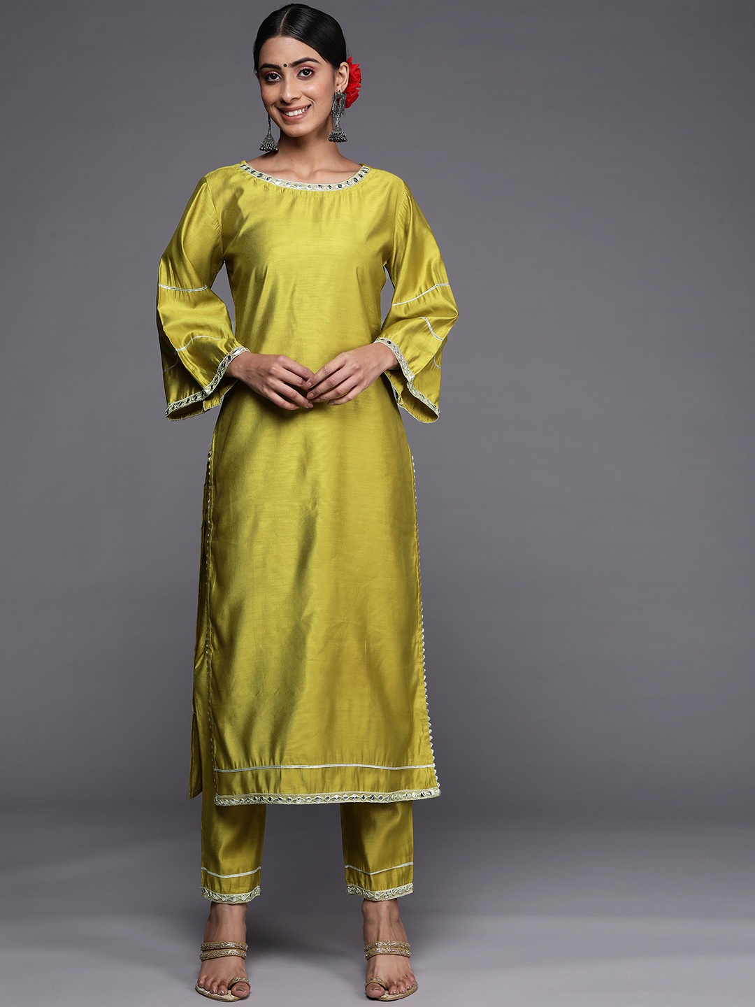 

Indo Era Women Olive Green Yoke Design Mirror Work Liva Kurta with Trousers