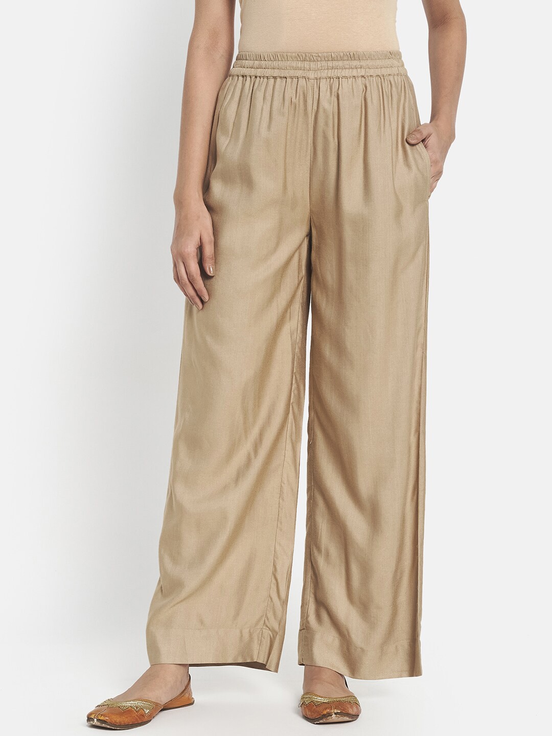 

Fabindia Women Beige Solid Ethnic Slip On Palazzos