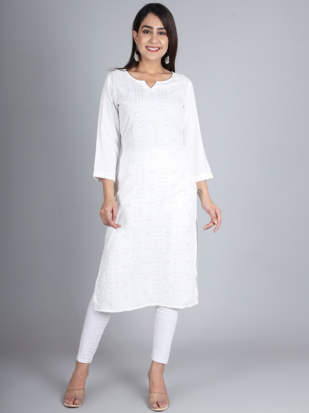 

IkDaiya Women White Embroidered Straight Rayon kurta