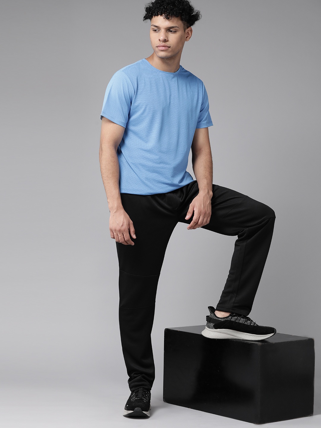 

PROWL by Tiger Shroff Men Black Solid Speed-Dry Track Pants