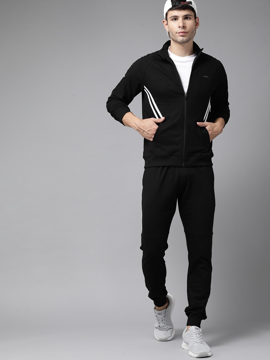 

PROWL by Tiger Shroff Men Black Solid Running Tracksuits