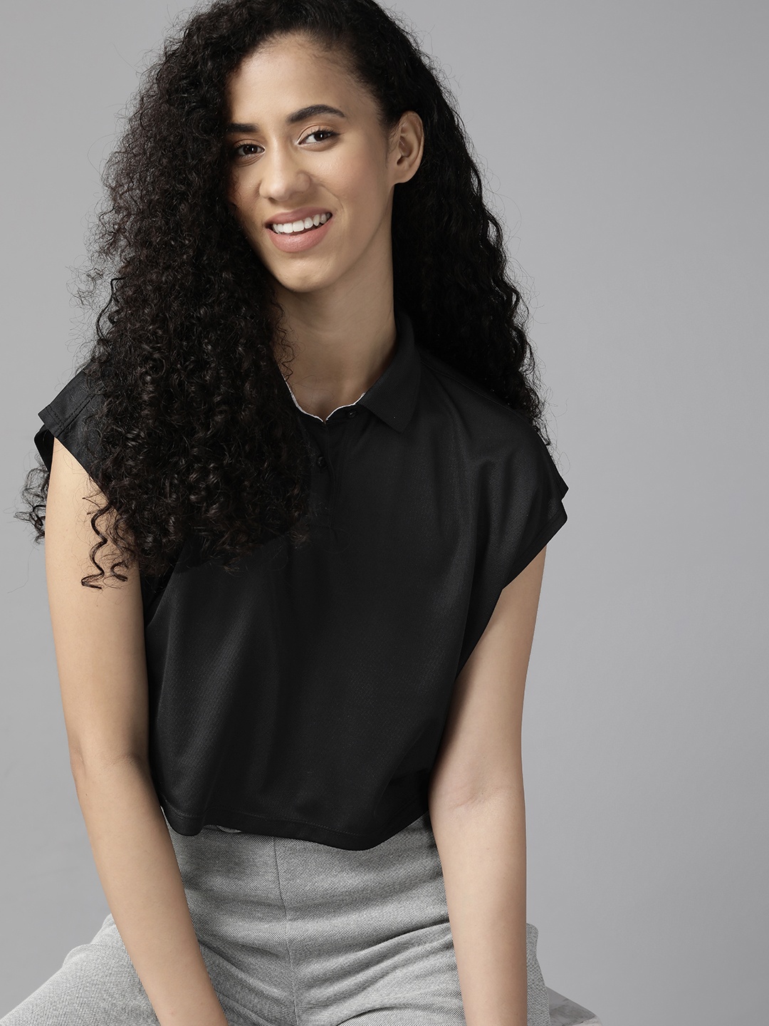 

PROWL by Tiger Shroff Women Black Polo Collar Extended Sleeves Anti-Fit T-shirt