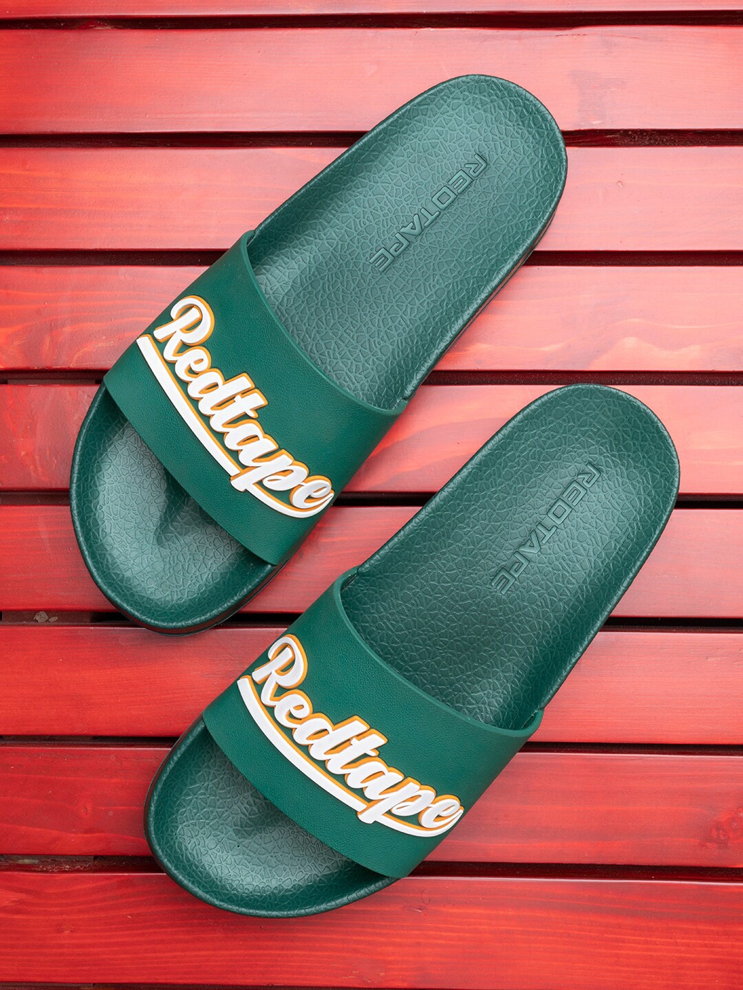 

Red Tape Men Green & White Printed Rubber Sliders