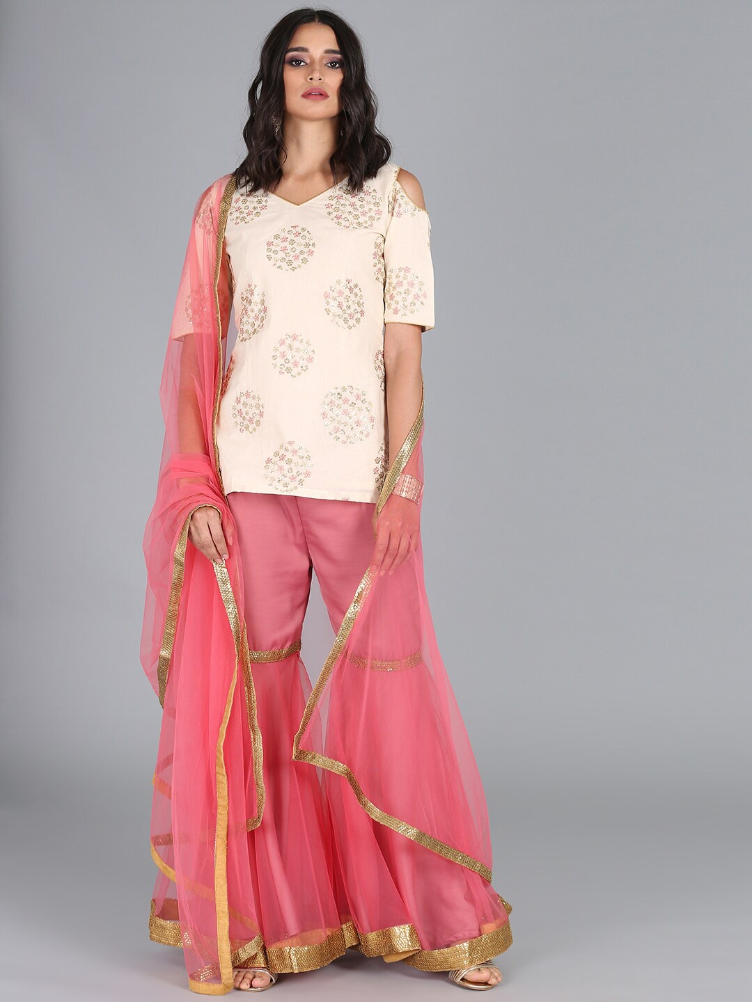 

Ethnovog Women Off White Floral Embroidered Kurta with Sharara With Dupatta