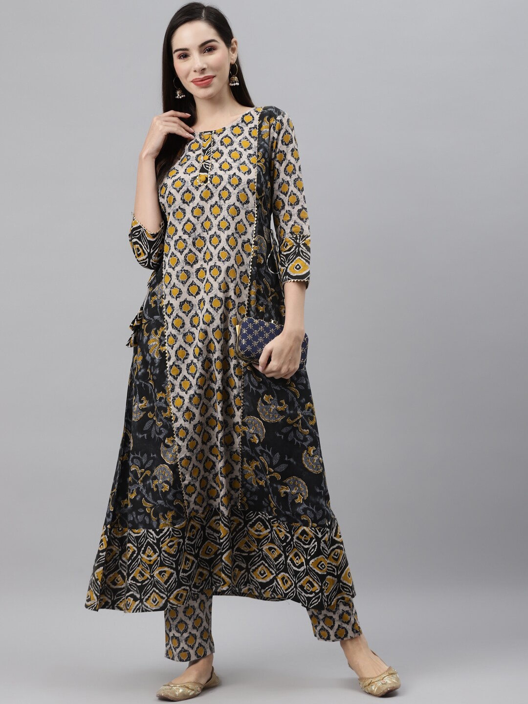 

Indibelle Women Beige Floral Printed Panelled Pure Cotton Kurta with Trousers