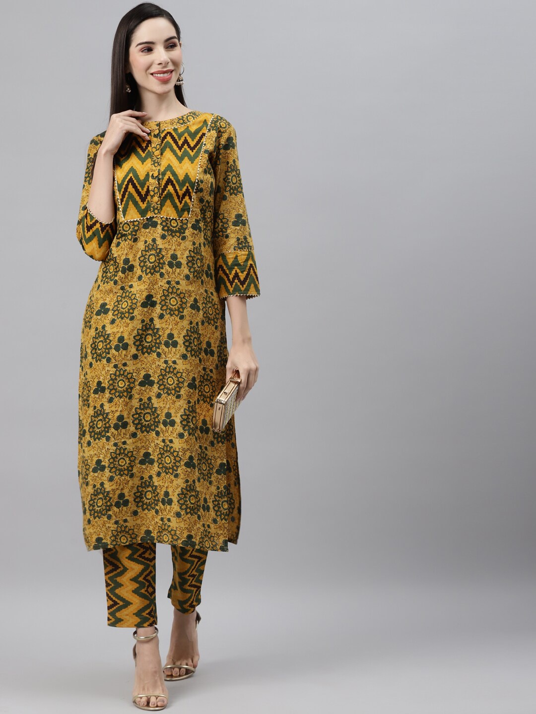 

Indibelle Women Mustard Yellow Printed Panelled Pure Cotton Kurti With Trousers