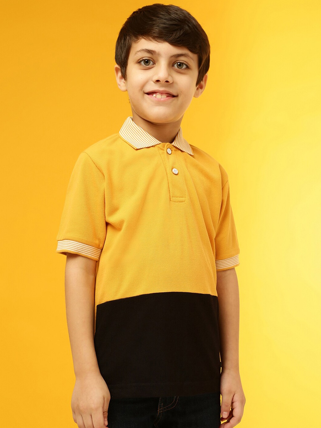 

Instafab Boys Mustard Yellow & Black Colourblocked Polo Collar T-shirt