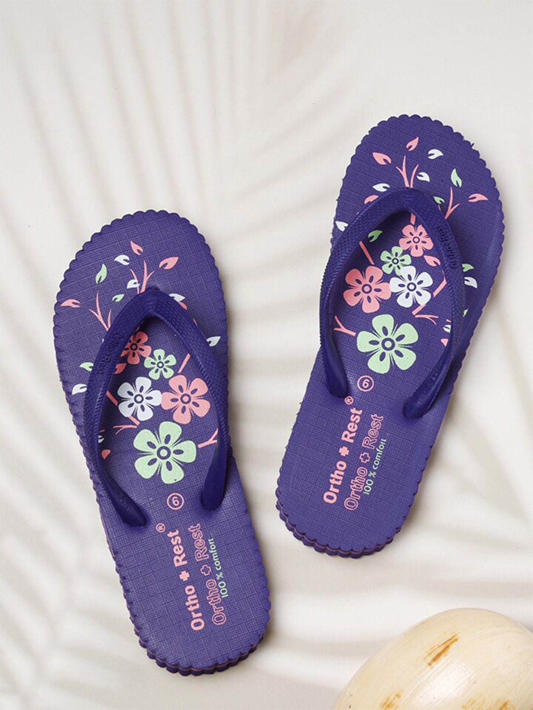 

Ortho Rest Women Purple & Green Printed Rubber Thong Flip-Flops