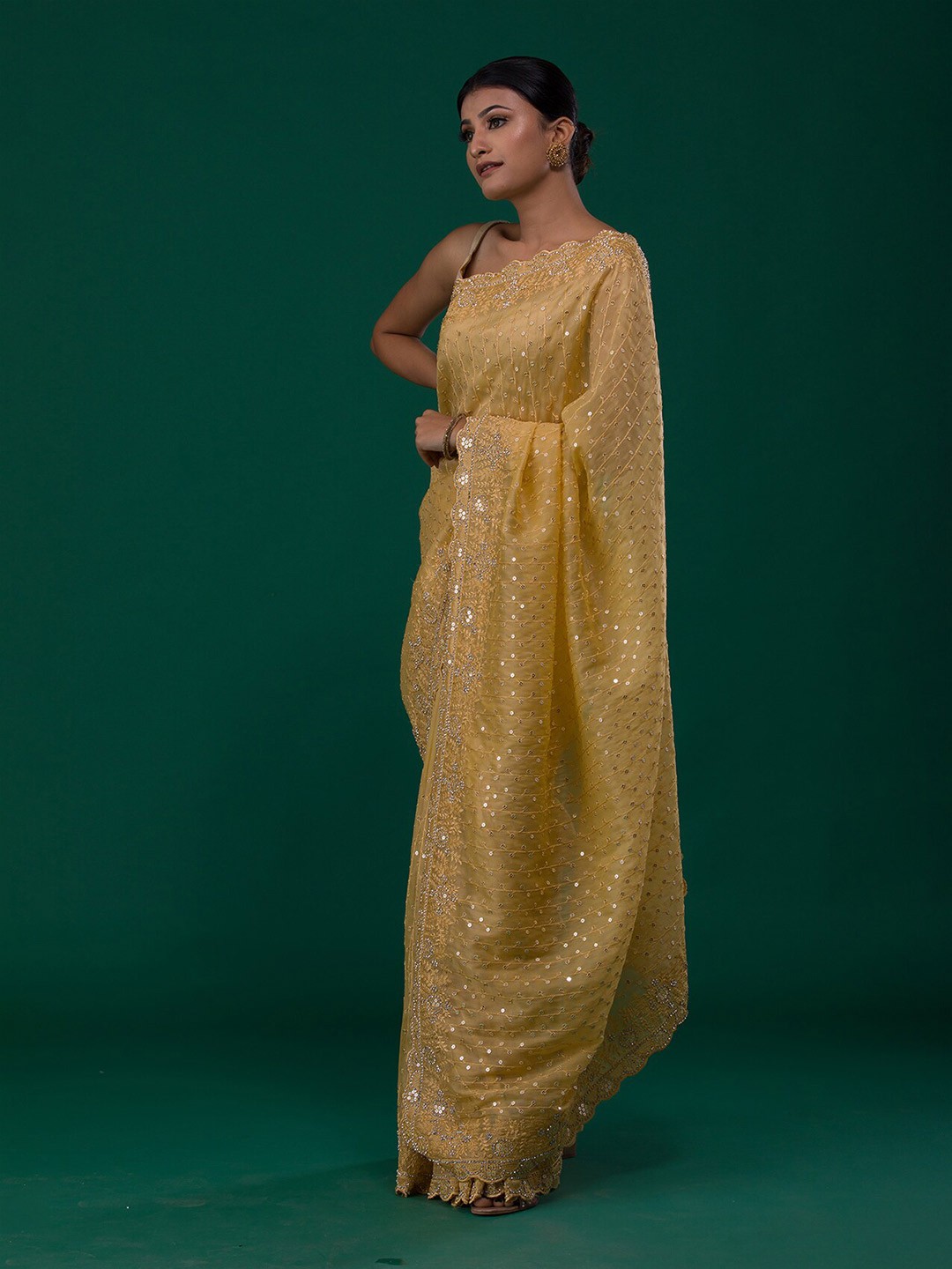 

Koskii Mustard Embellished Beads and Stones Saree